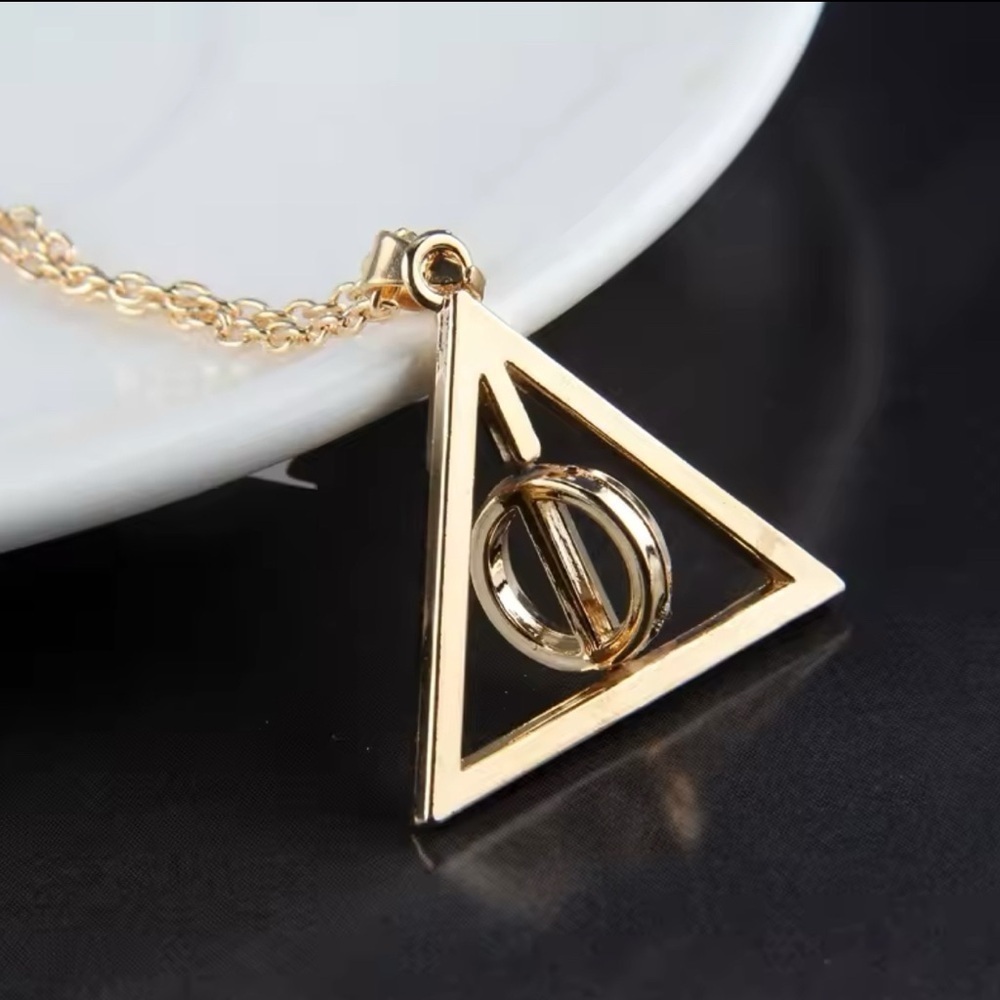 Gold Tone Harry Potterter Deathly Hallows Symbol With Spinning Center Circle - Picture 1 of 8